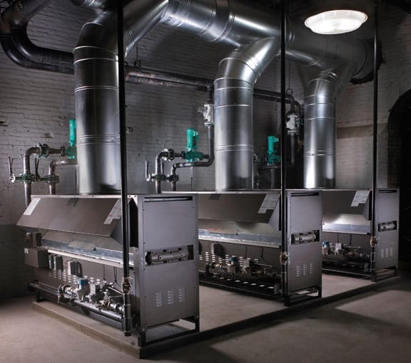 TriplexBoilers_web_optmz_0 Triplex 1,000,000 BTU Boilers: The system heats a water source heat pump loop serving an industrial mill complex.